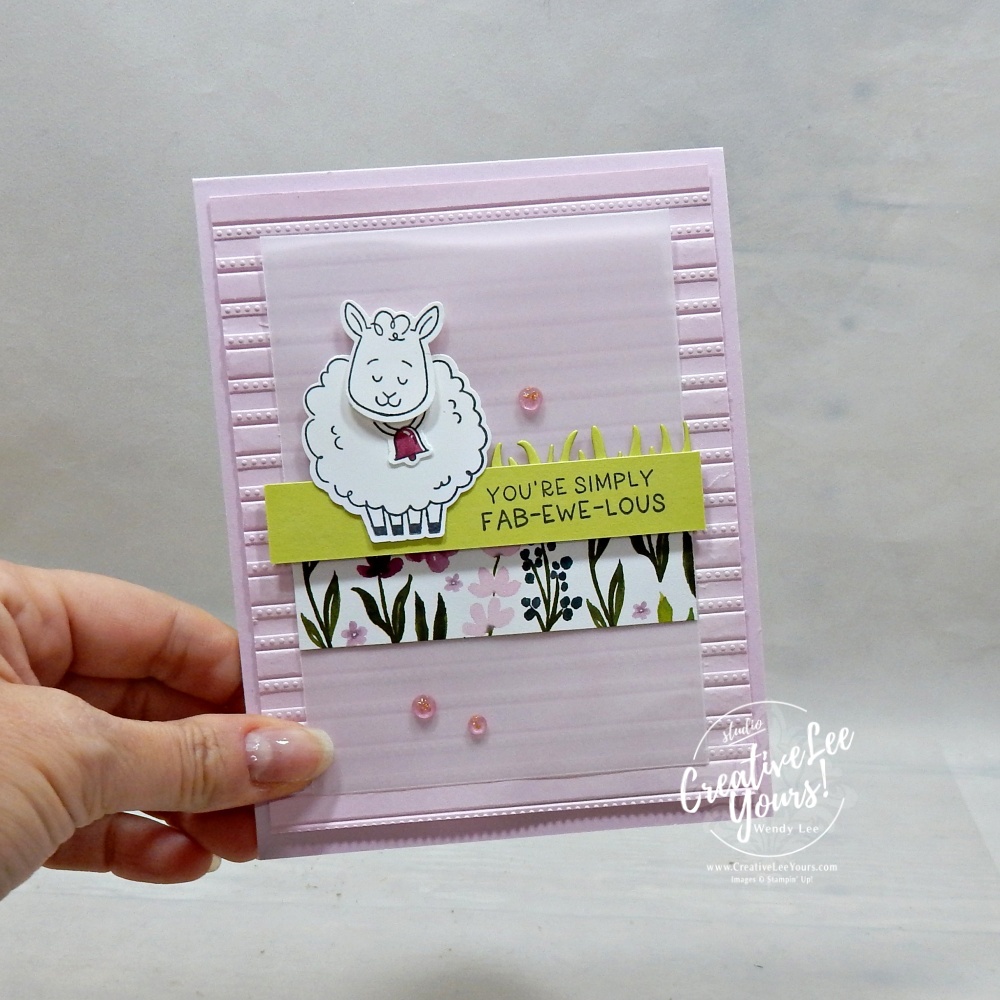 simple handmade card with vellum, embossing, and layered paper