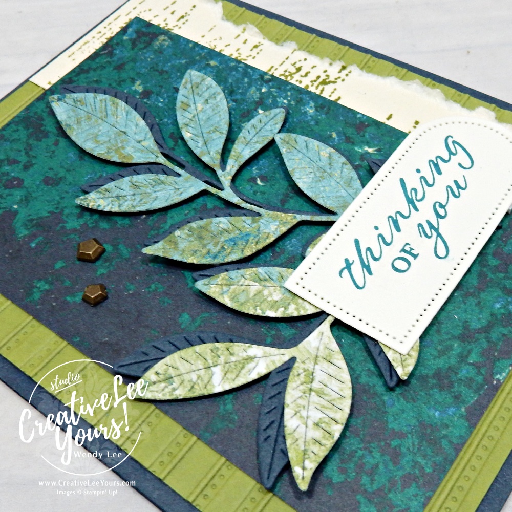 Handmade textured card with layered cardstock, designer paper, die-cut leaves, and a thinking of you sentiment