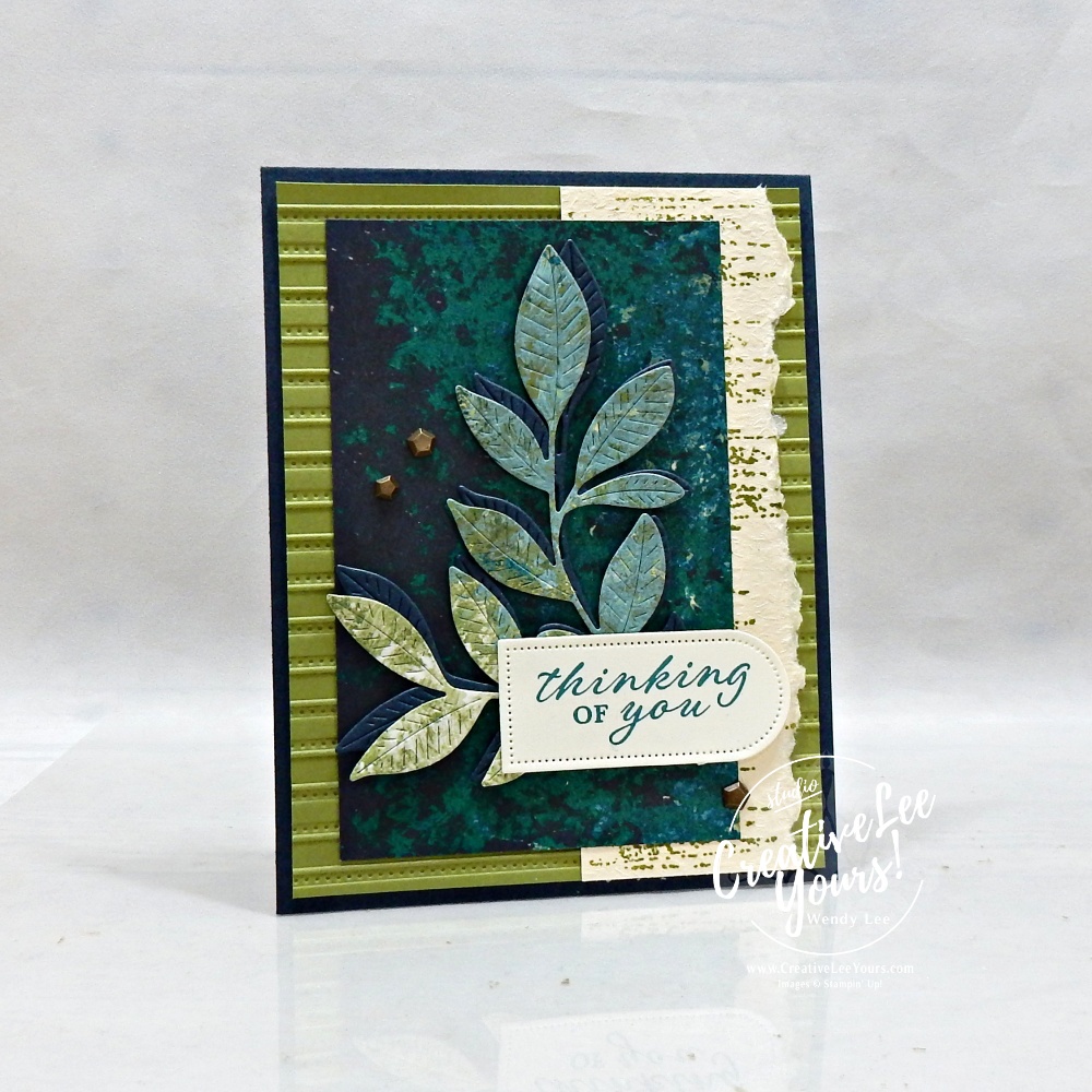 Handmade textured card with layered cardstock, designer paper, die-cut leaves, and a thinking of you sentiment