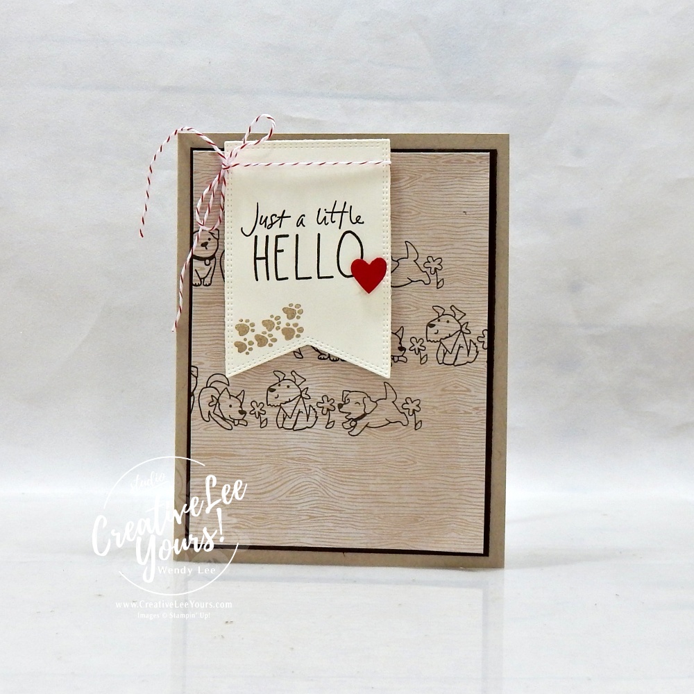 handmade card with neutral tones and stamped puppy background