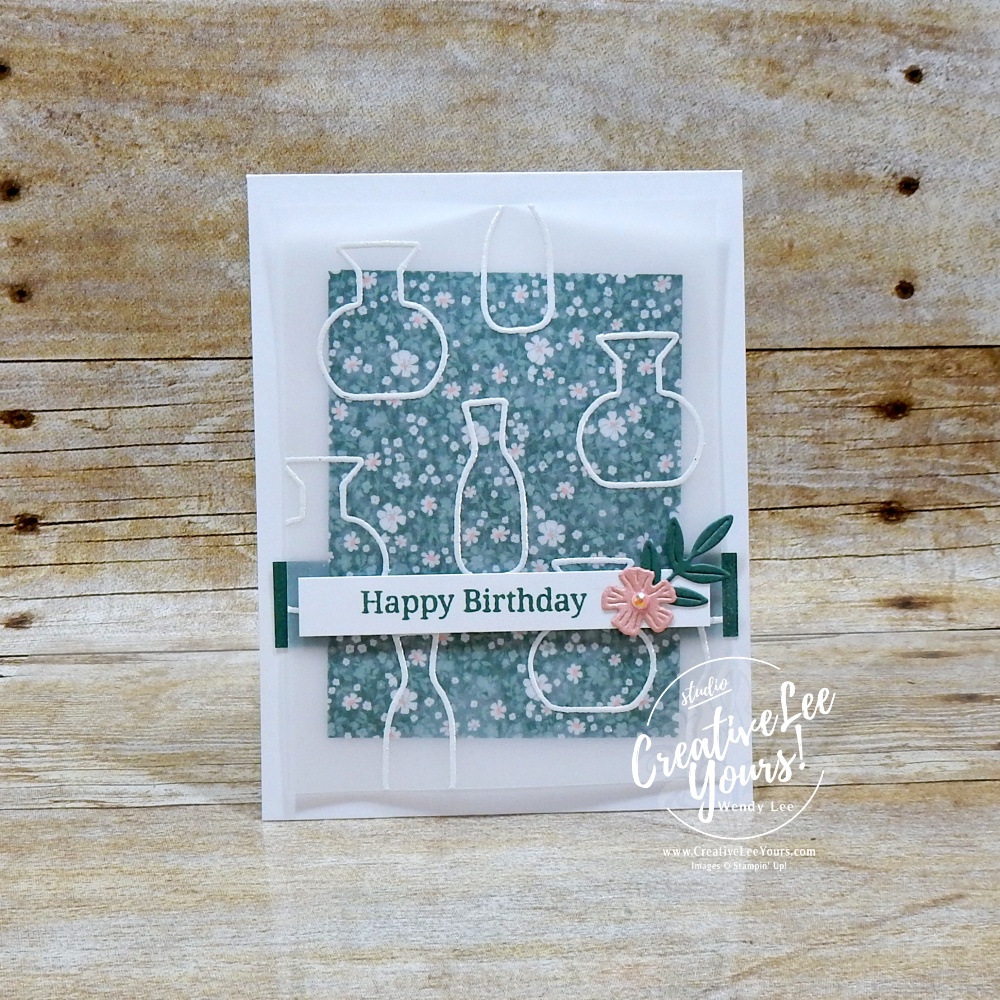 Elegant handmade card with embossed vellum overlay, floral DSP background, and layered sentiment strip on white card base