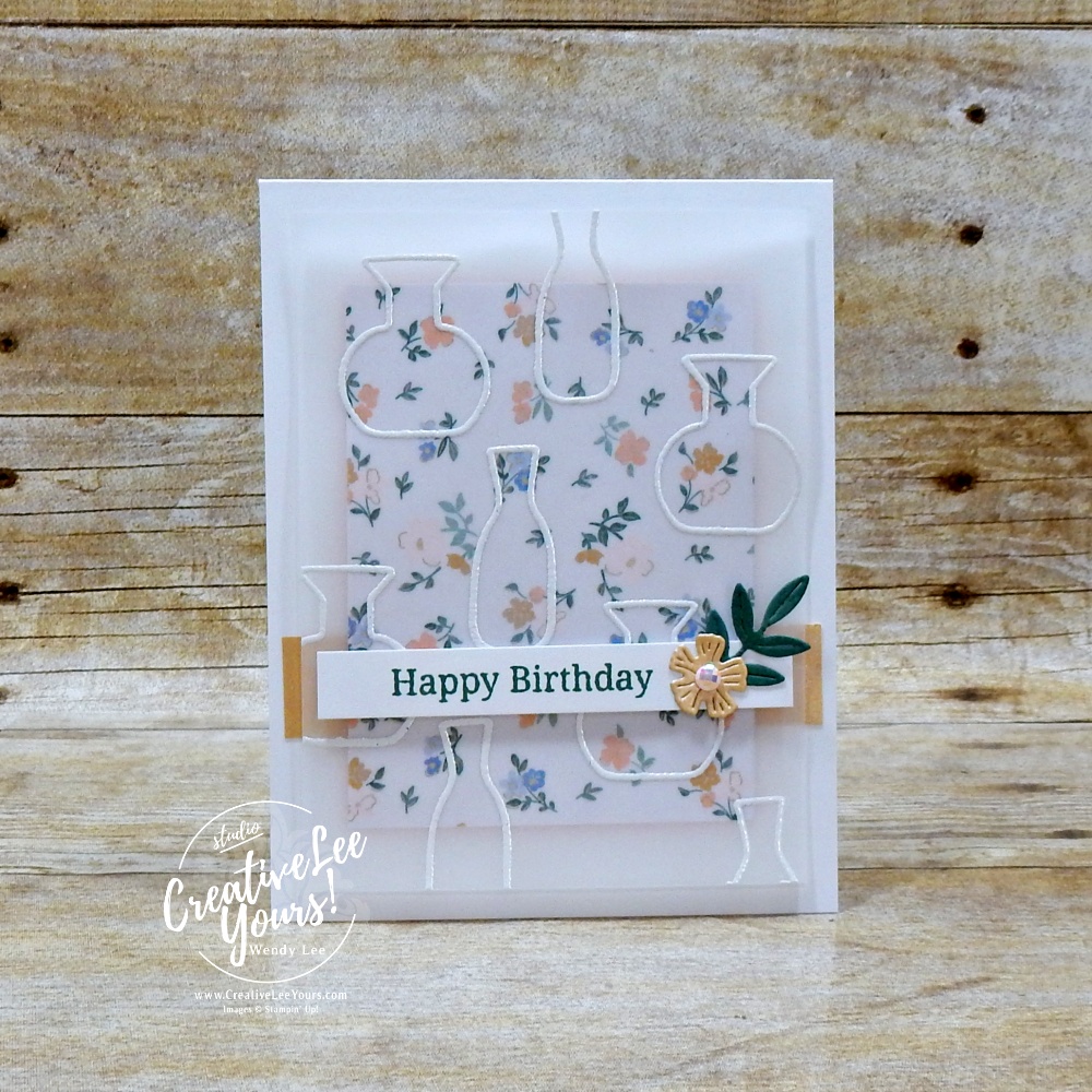 Elegant handmade card with embossed vellum overlay, floral DSP background, and layered sentiment strip on white card base