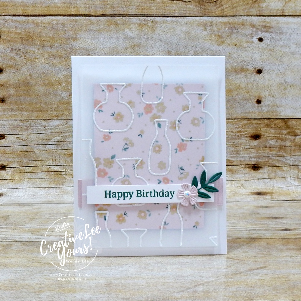 Elegant handmade card with embossed vellum overlay, floral DSP background, and layered sentiment strip on white card base