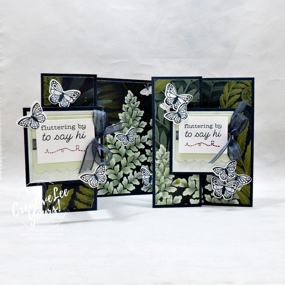 Interactive butterfly fun fold card opened to reveal layered floral design and dimensional butterflies