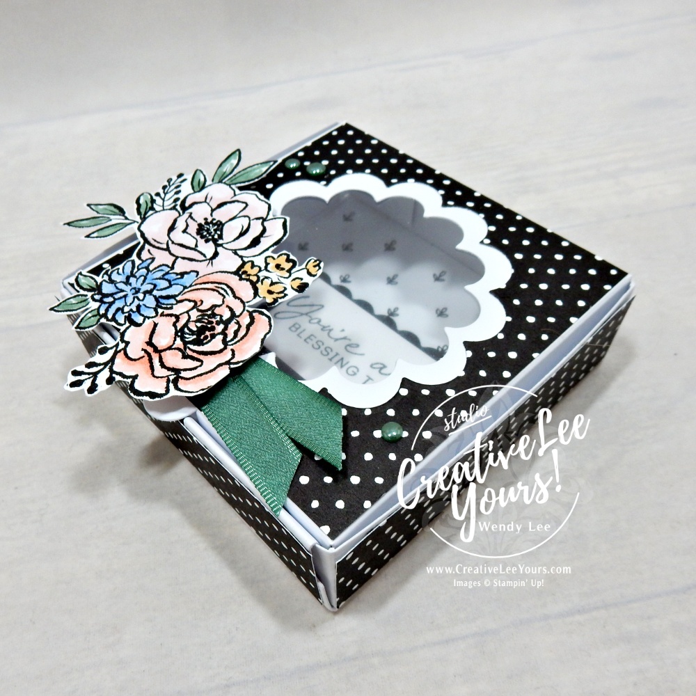 Close-up of scalloped window gift box featuring layered floral focal point and shimmer accents