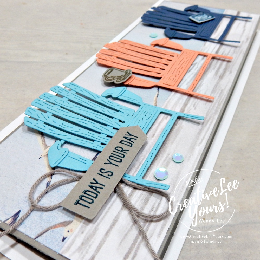 Close-up of layered Adirondack chair die cuts on slimline handmade card with soft coastal colors