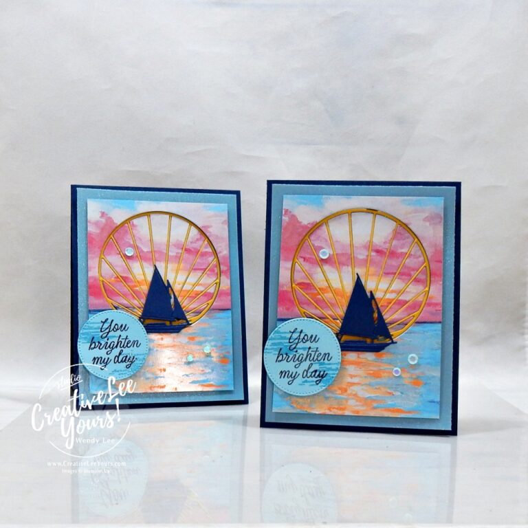 Handmade Sunset Coast card featuring Scenic Coast designer paper, shimmer vellum, inlaid sun ray die cut, sailboat silhouette, and You Brighten My Day sentiment.