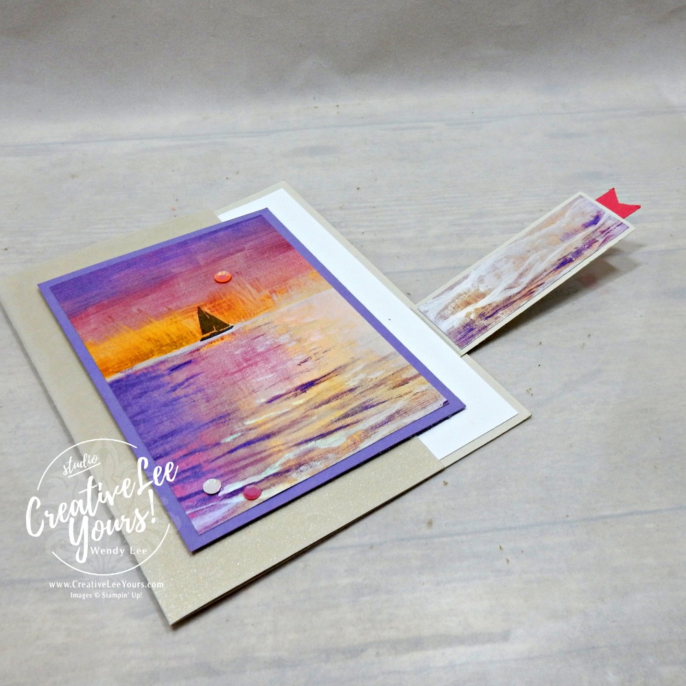 Interactive cut away front card opened to reveal hidden magnetic closure and scenic coastal sunset design