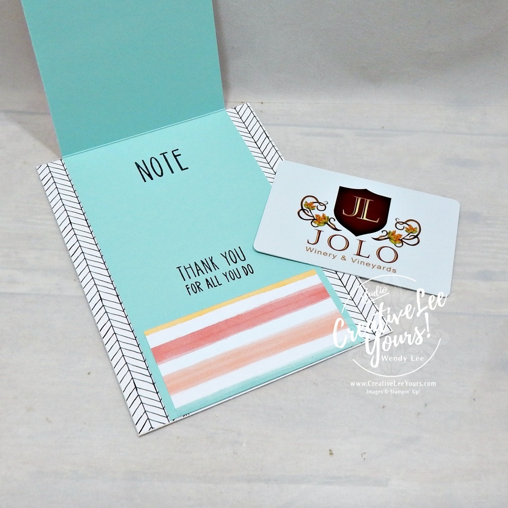 Open handmade card showing hidden gift card pocket created with designer paper and stamped sentiment.