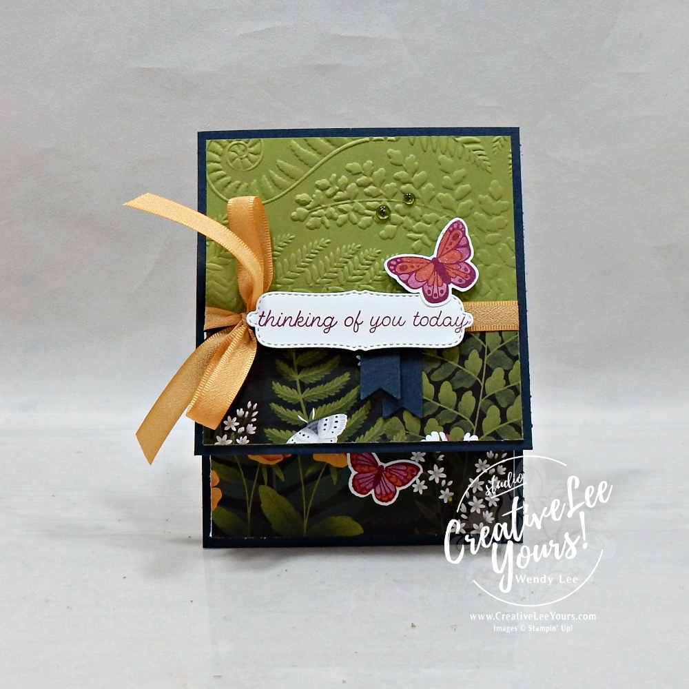 Closed Vertical Z Fold butterfly card featuring Moonlit Flora Designer Series Paper, embossed Old Olive panel, ribbon, punched butterflies, and Berry Burst stamped sentiment.
