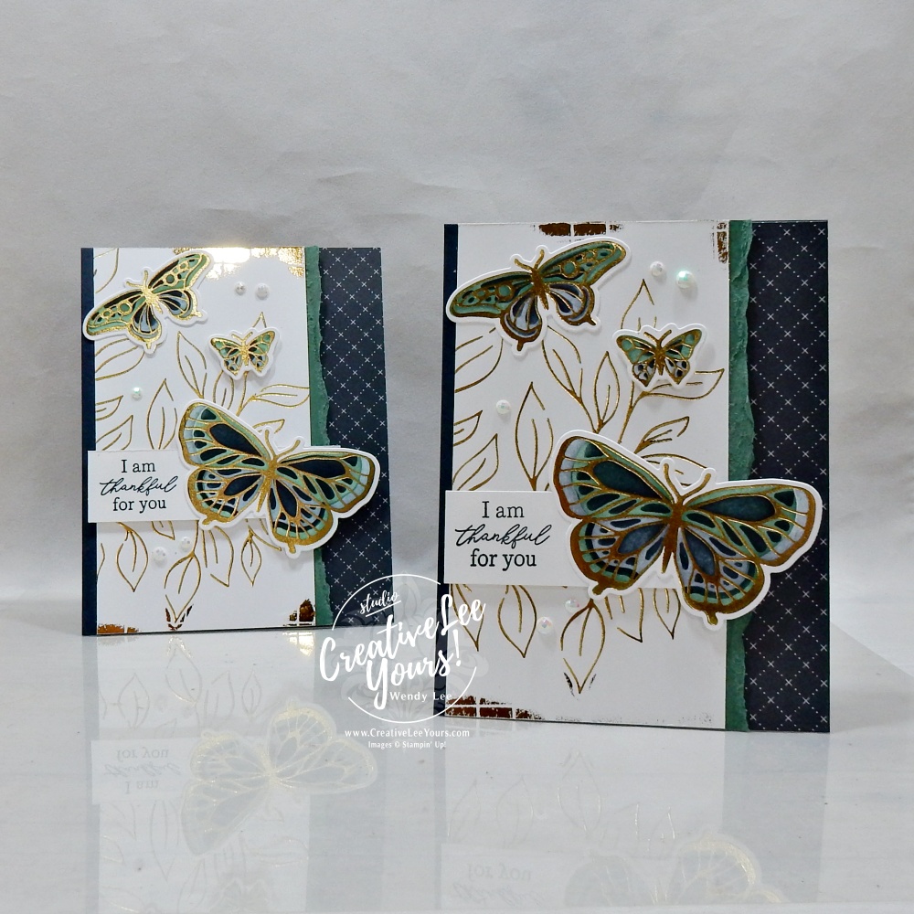 Elegant handmade butterfly card featuring metallic hot foil butterflies, embossed background, layered greenery, and Hot Foil accents.