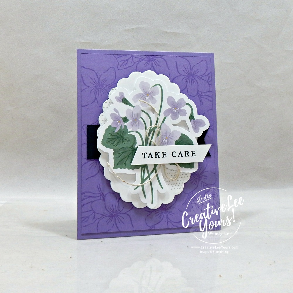 Highland Heather handmade greeting card featuring floral ephemera and a subtle stamped background using Versamark ink.