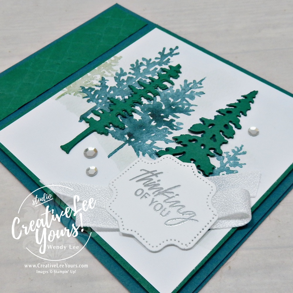 Whispering Woods card with layered Shaded Spruce die-cut trees and Thinking of You sentiment